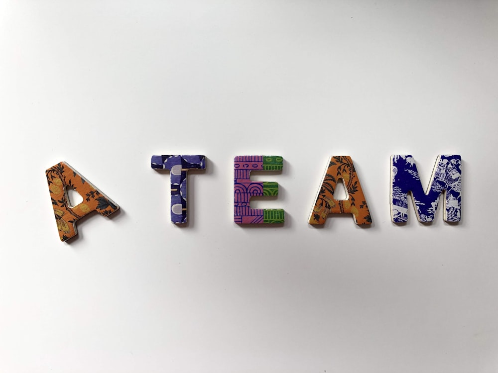 assorted-color A Team text wall decor