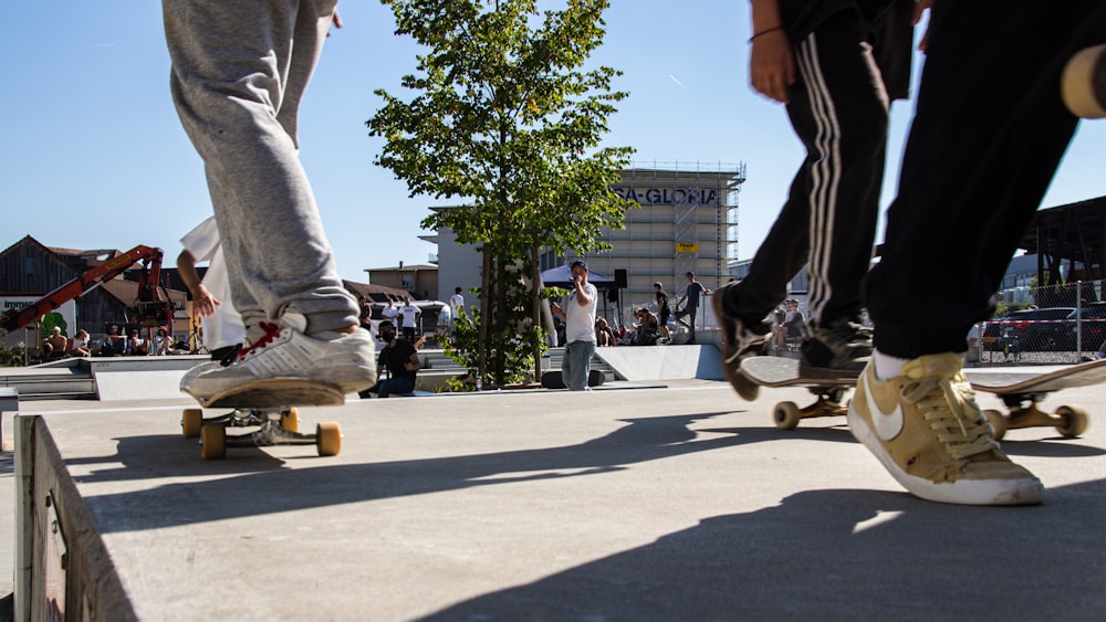 people skating on street during daytime