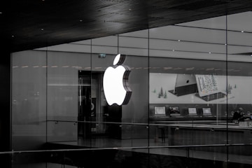 grayscale photo of Apple emblem