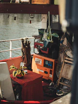 A cozy ship cabin with soft lighting and the JL Marine portable humidifier gently misting the air.