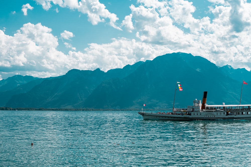 a boat floating on top of a large body of water