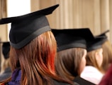 women on square academic caps