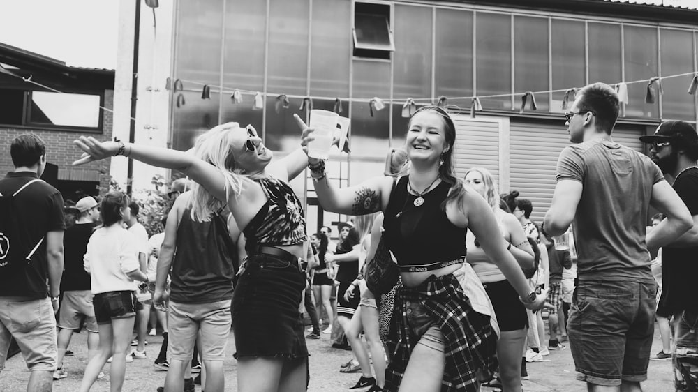 grayscale photo of people dancing