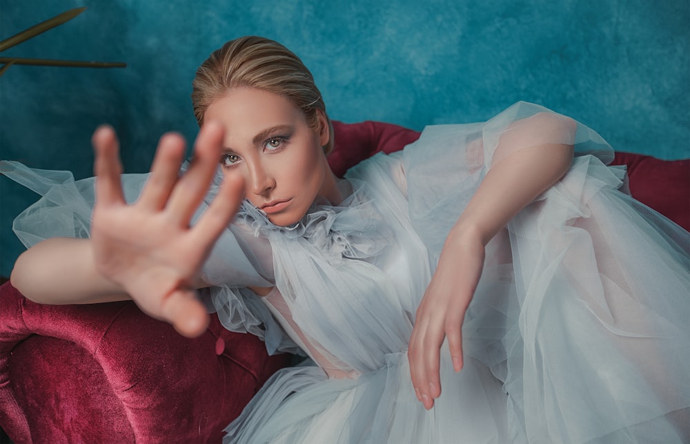 woman sitting on sofa