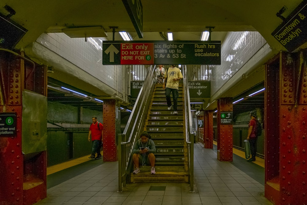 people near escalator