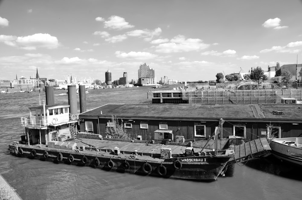 greyscale photo of boat