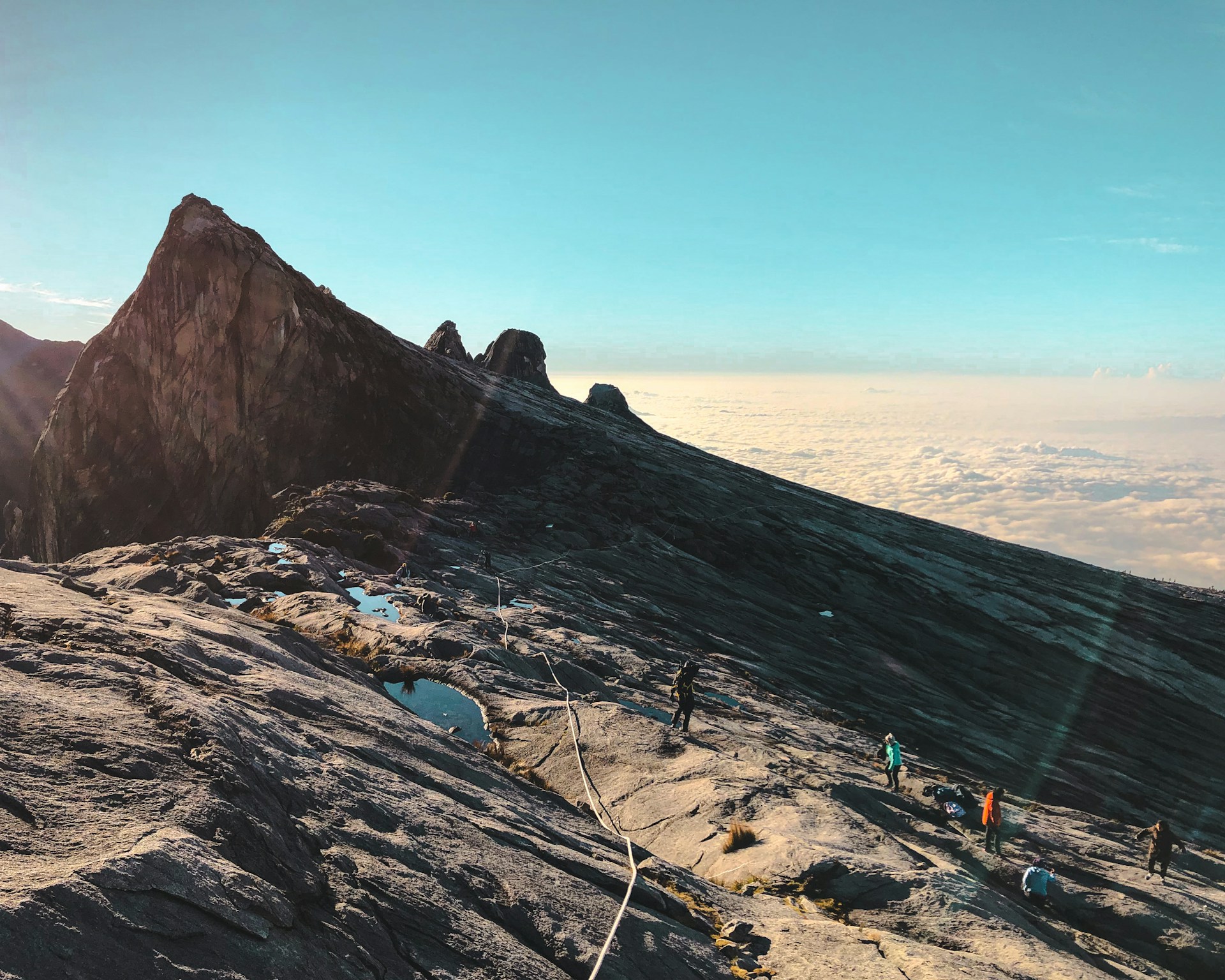 people climbing mountain