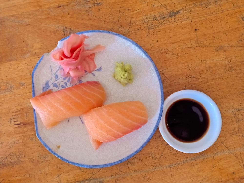 two fish on white plate