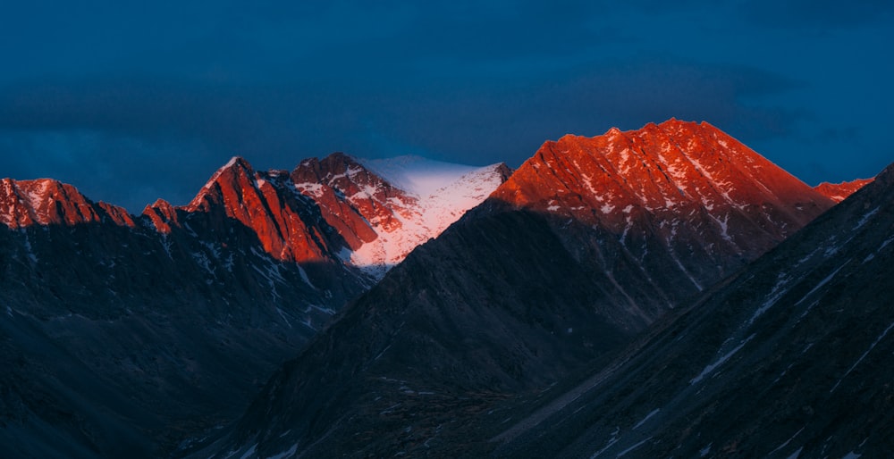 snow covered mountain during daytime