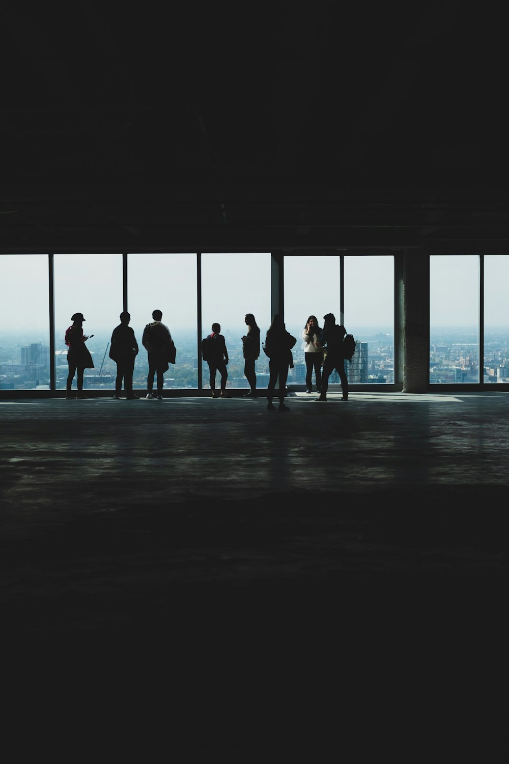 silhouette photography of people in tower