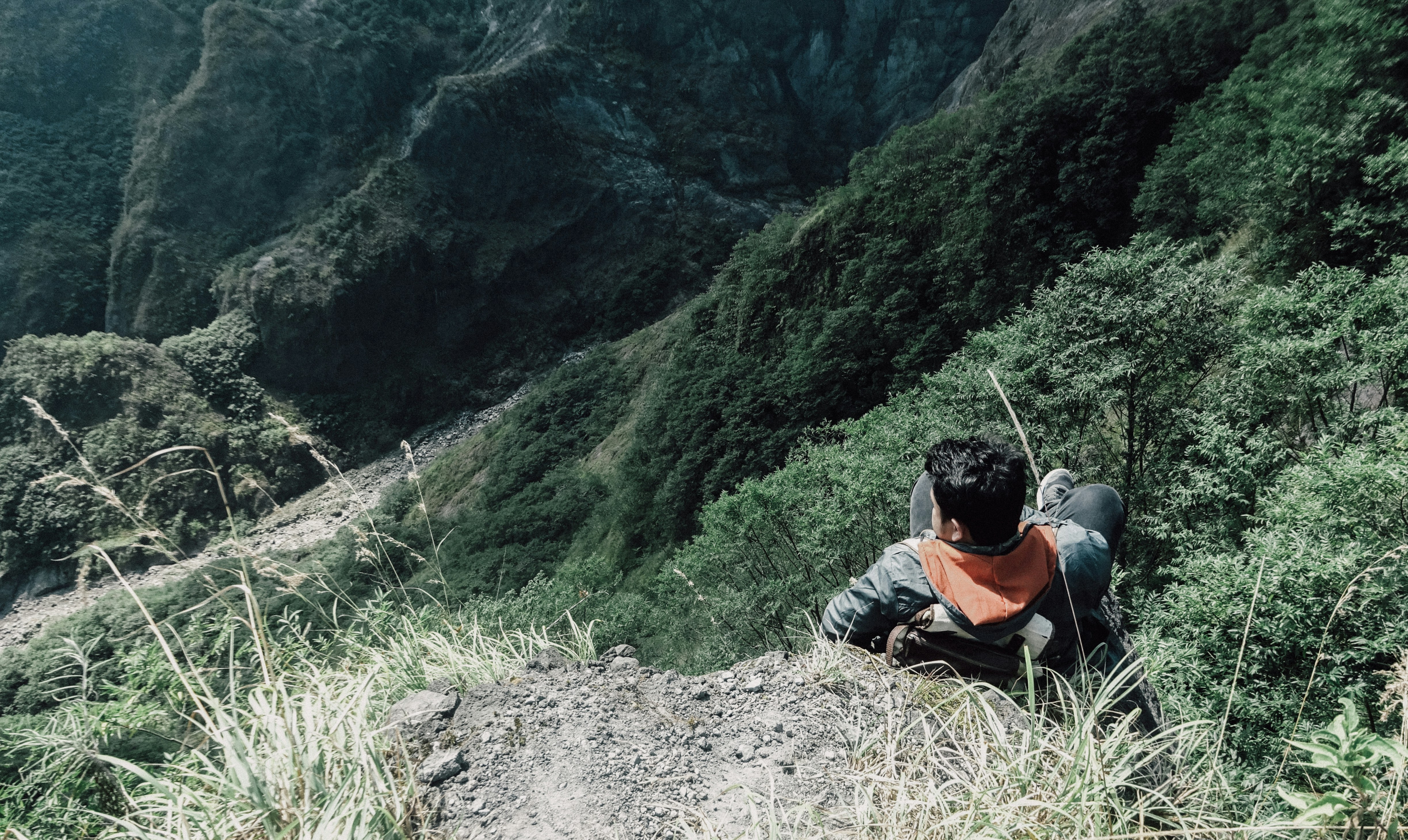 man sitting during daytime