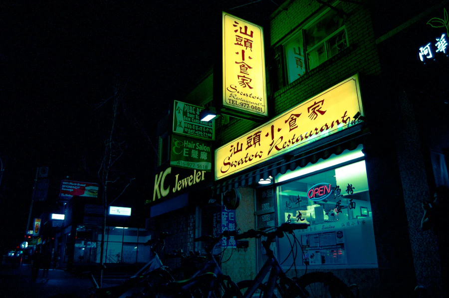 A bicycle parked outside a neighbourhood takeout storefront