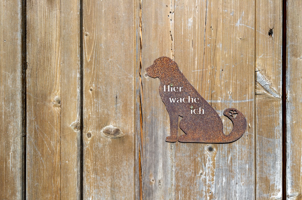 brown metal dog wall decor