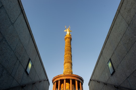brown concrete statue in Victory Column Germany