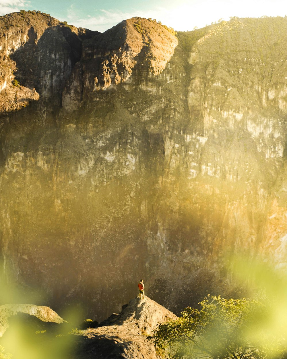 person standing on mountain