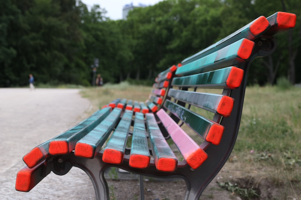 gray and red bench at daytime