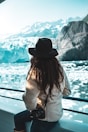 woman with a DLSR camera with icebergs