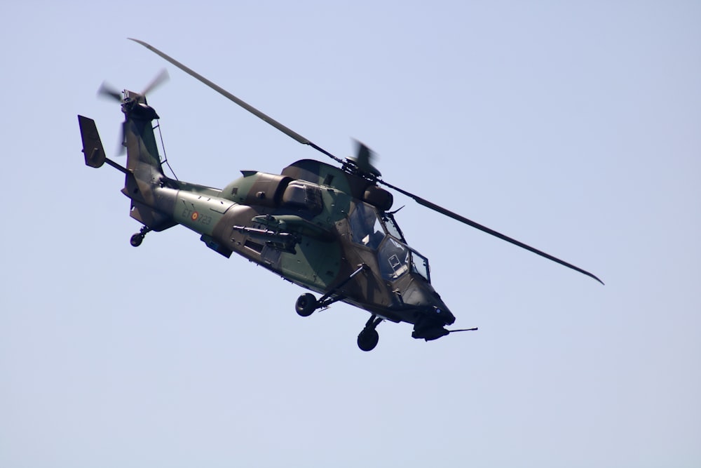 brown and green helicopter