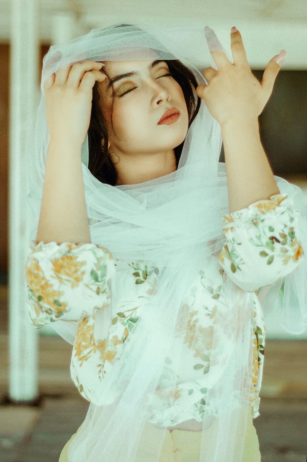 woman wearing white and yellow floral dress