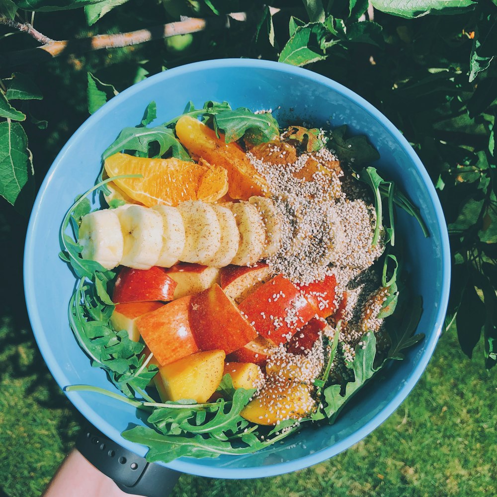 fruit salad on blue bowl