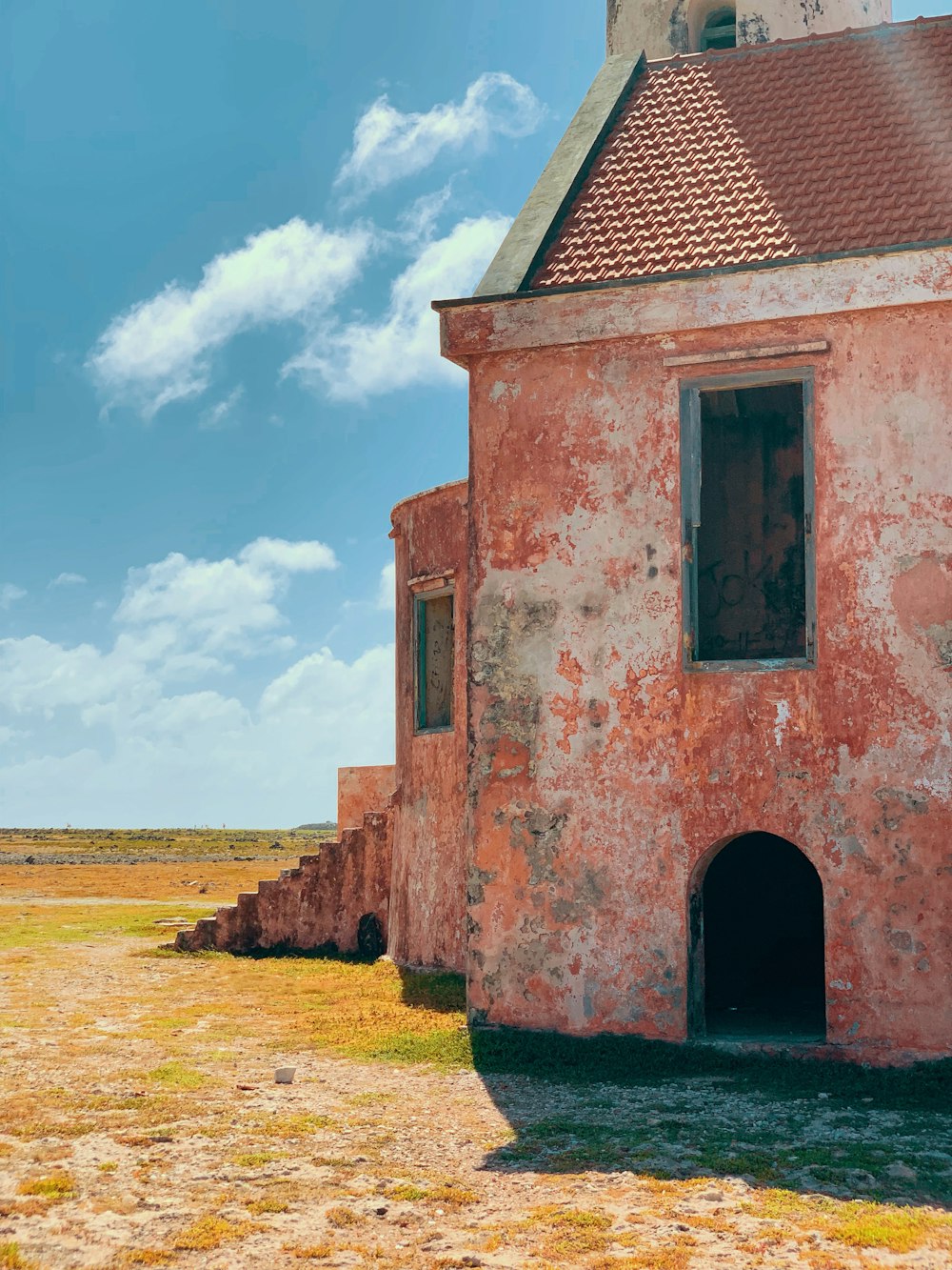 red concrete building during daytime