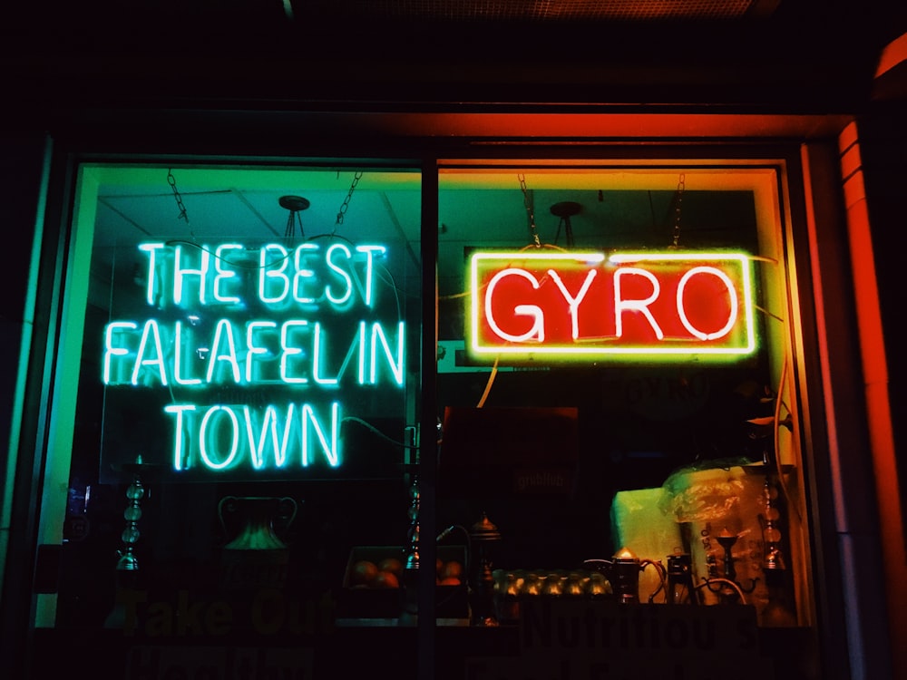 white and green the best falafel in town neon light
