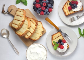 food lot in a white plate near fruits close-up photography