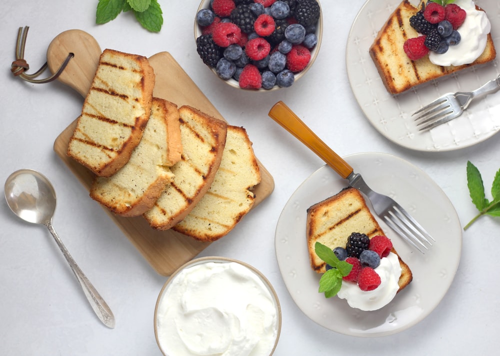 food lot in a white plate near fruits close-up photography