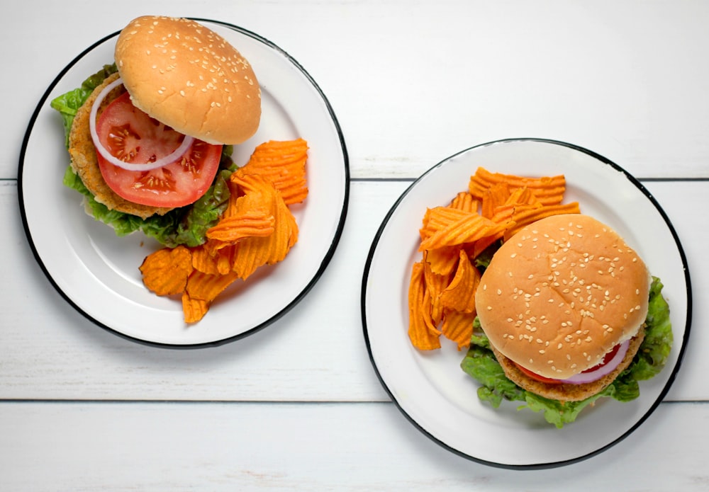 burger dish on round white ceramic plates