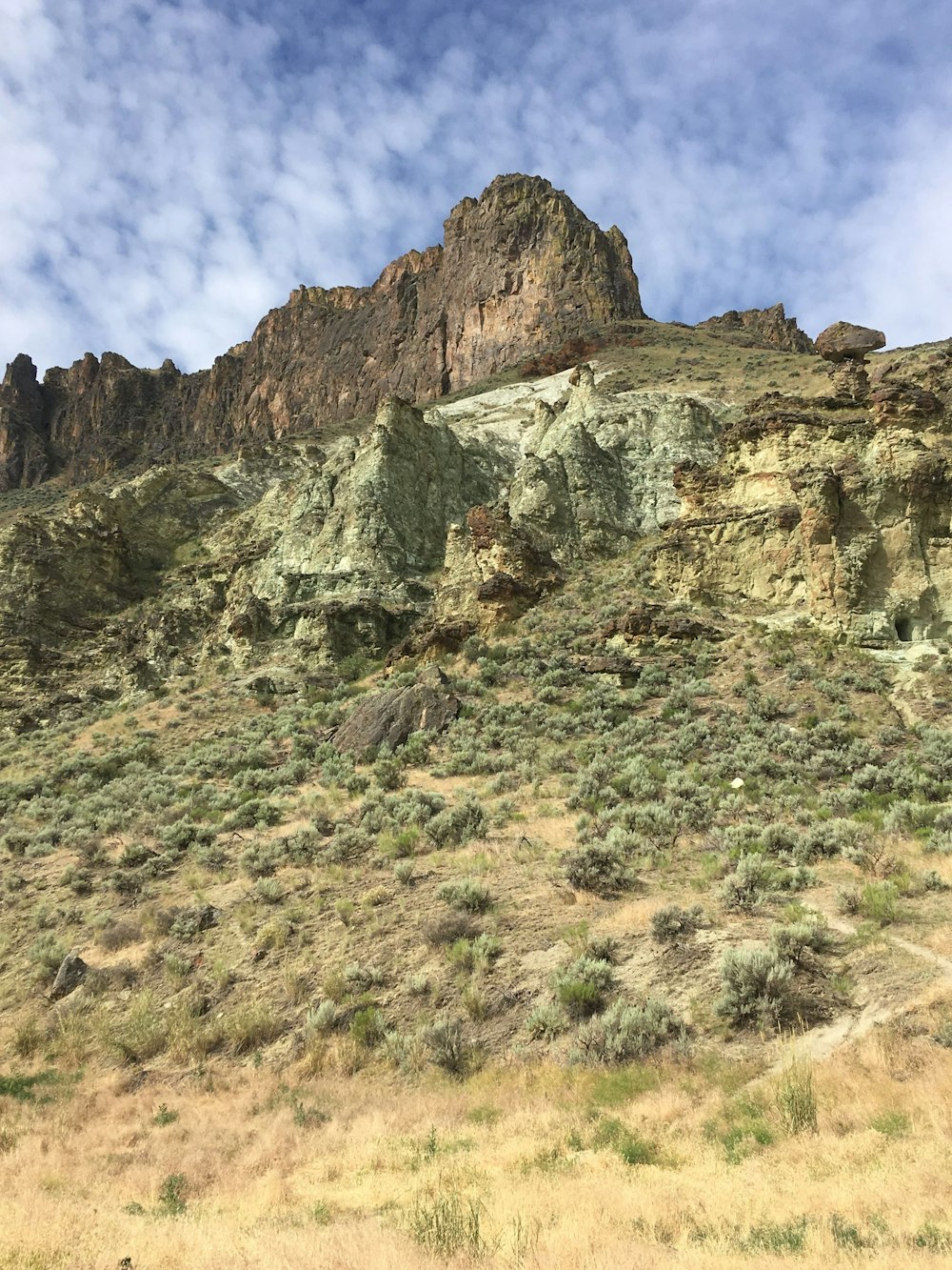 green and brown mountain at daytime