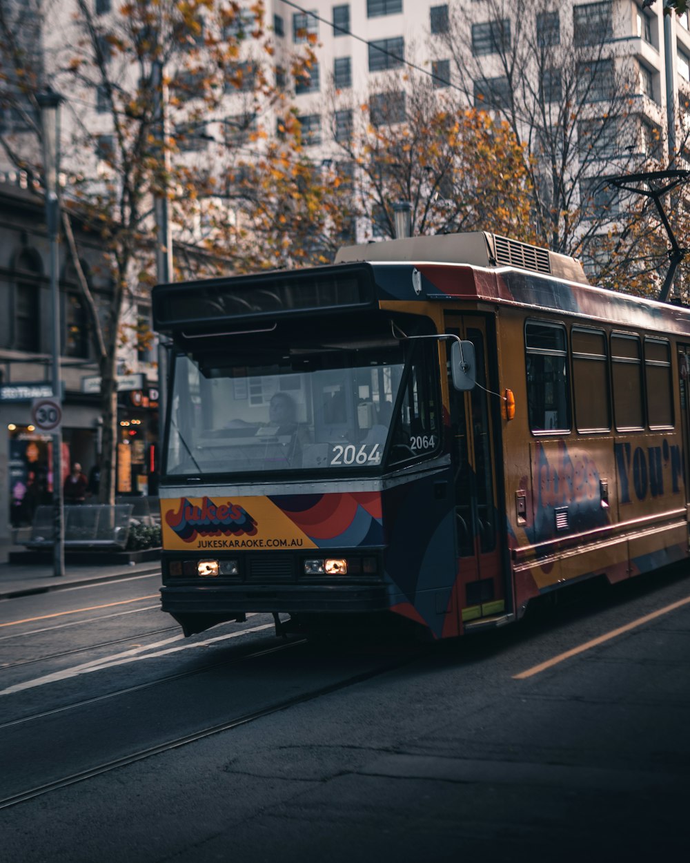 yellow and multicolored bus