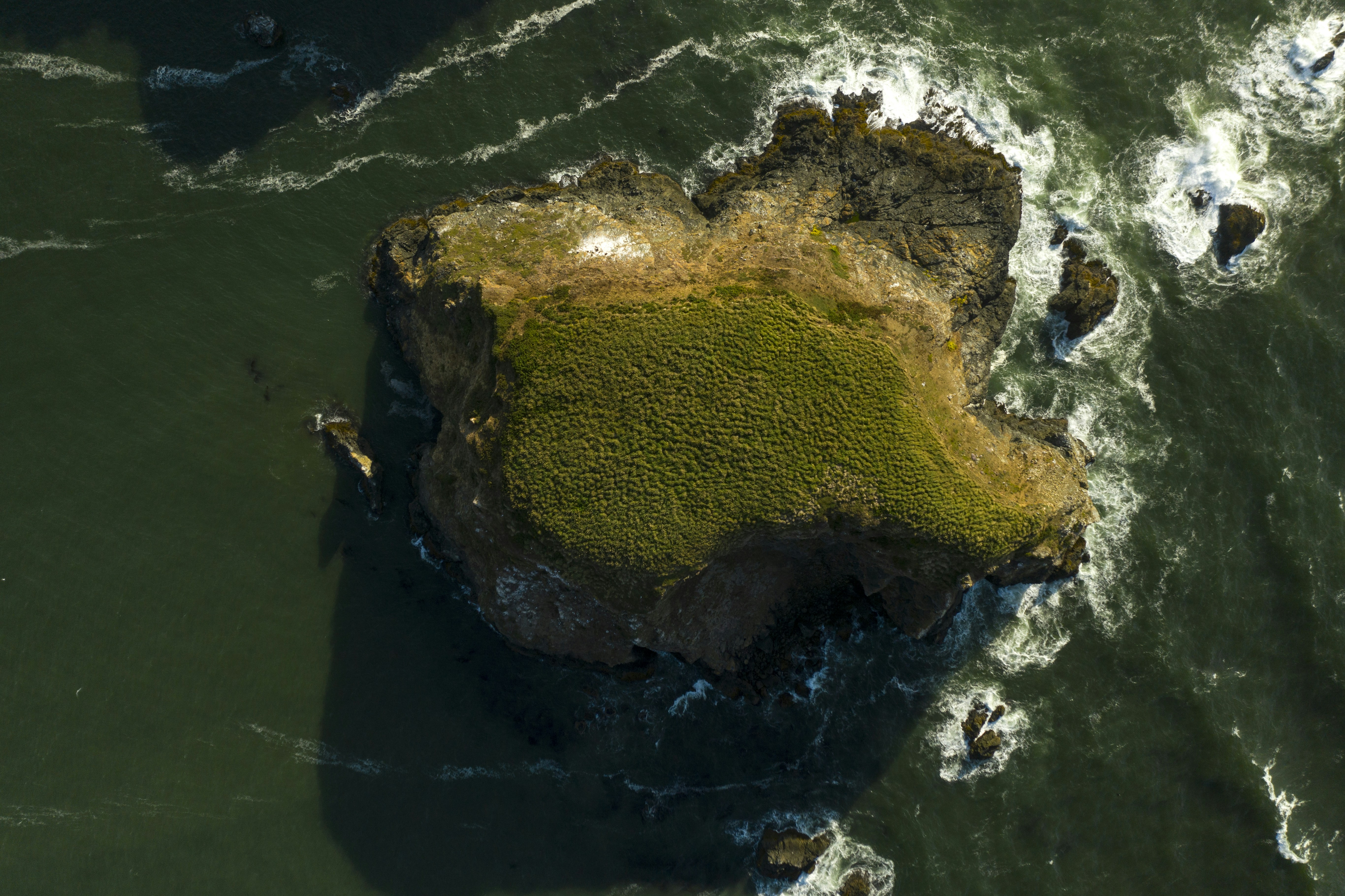 green island, I try to fly several hundred feet above these sea monoliths with my quietest drone so I don