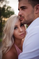 man hugging a woman