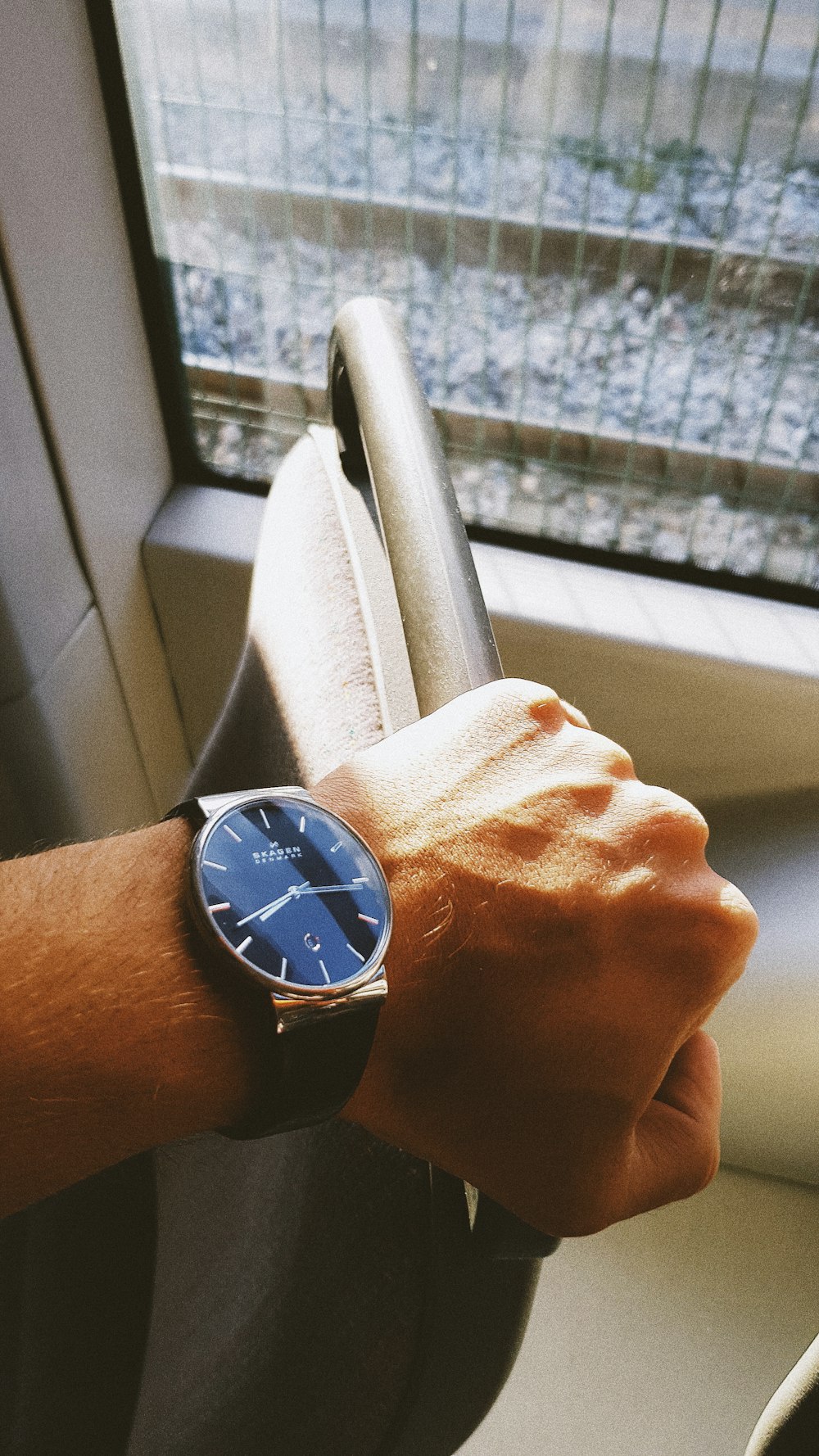 round blue and gold-colored analog watch