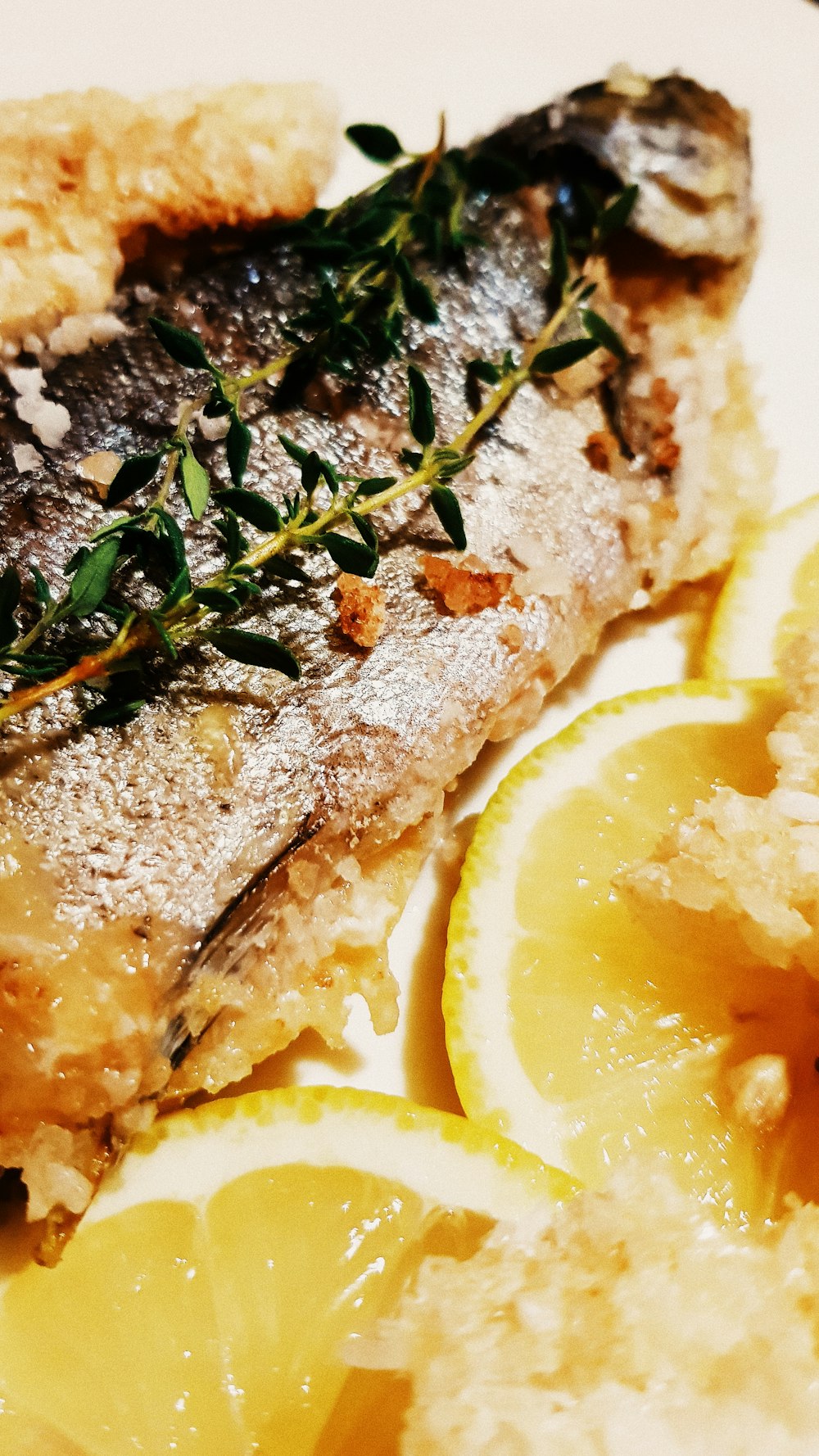 fish dish with sliced lemon