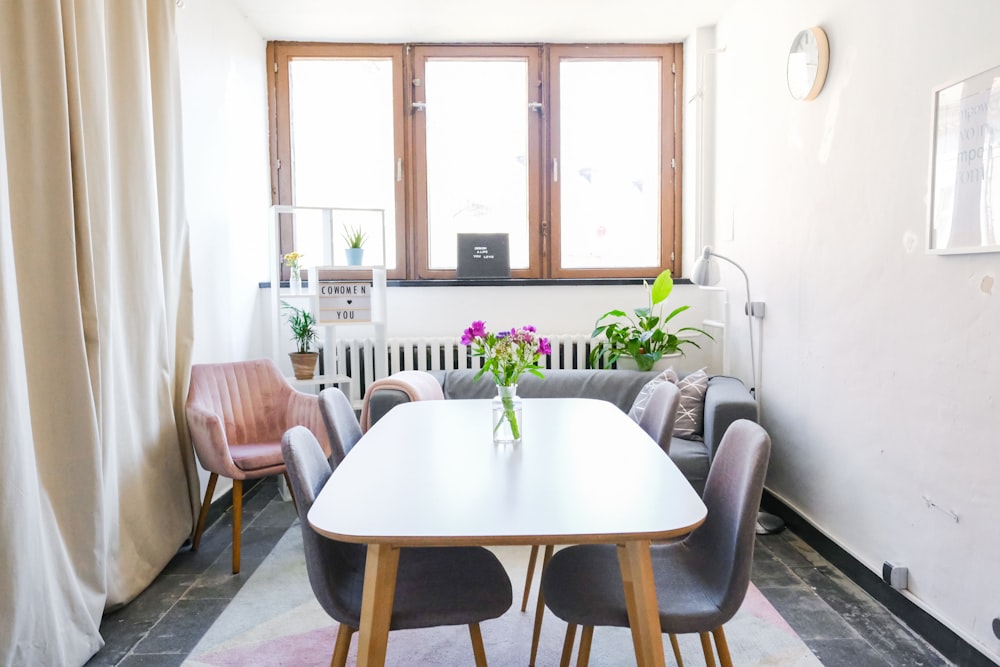 brown wooden table near wall