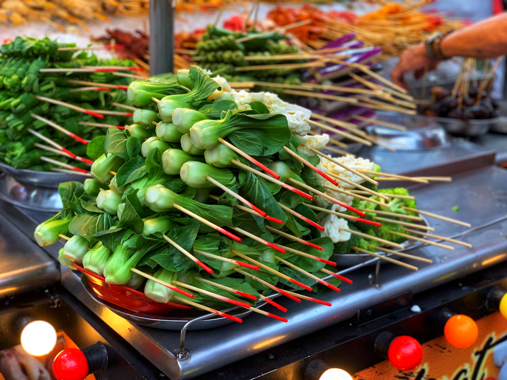 green vegetables on skewers