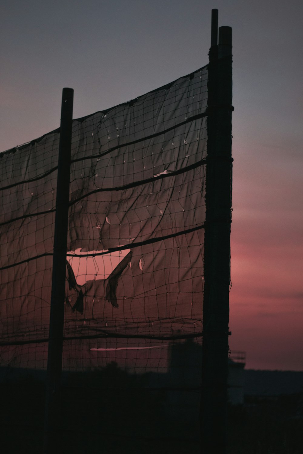 white net near mountain at daytime