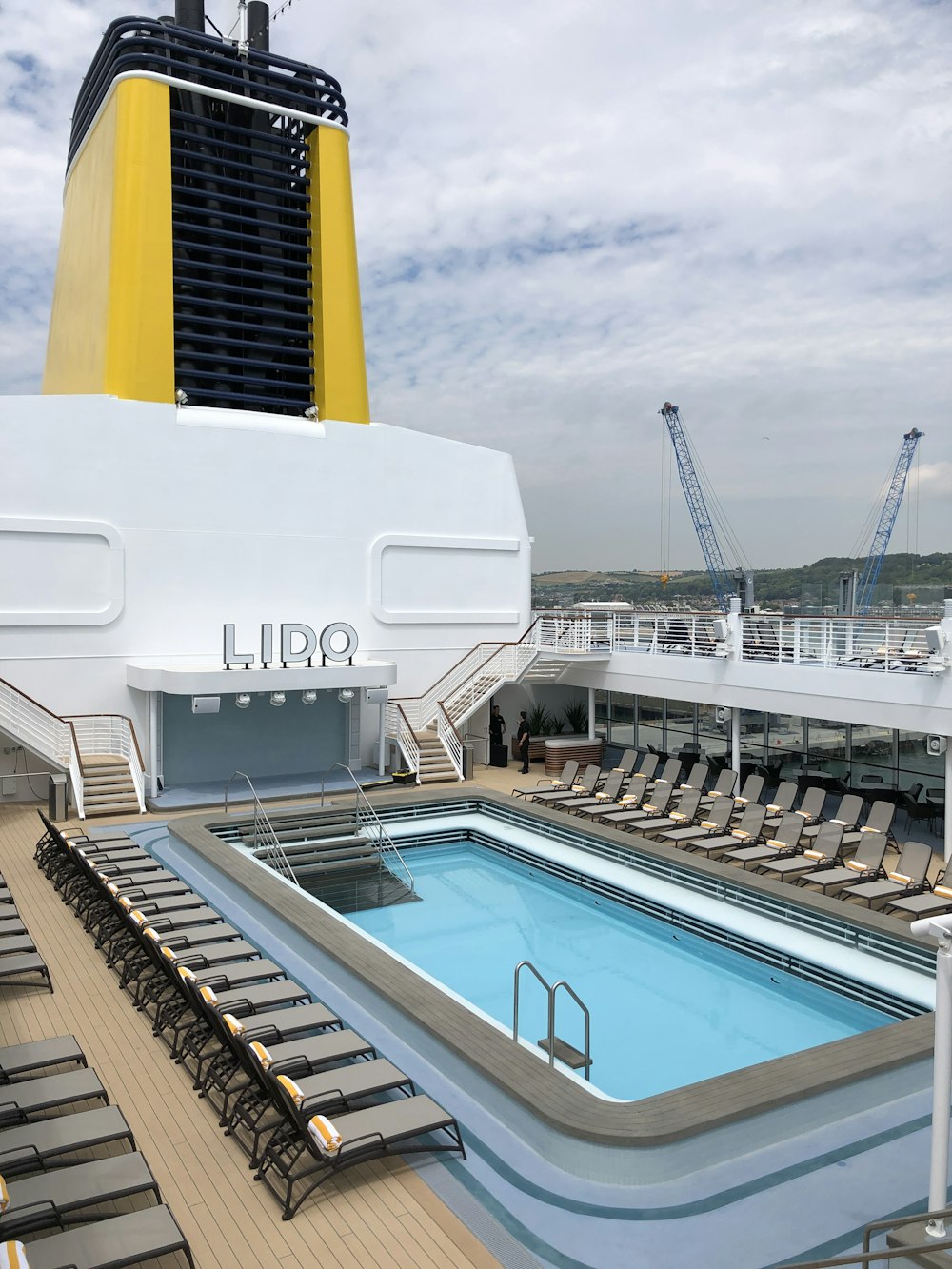 white and brown swimming pool during daytime