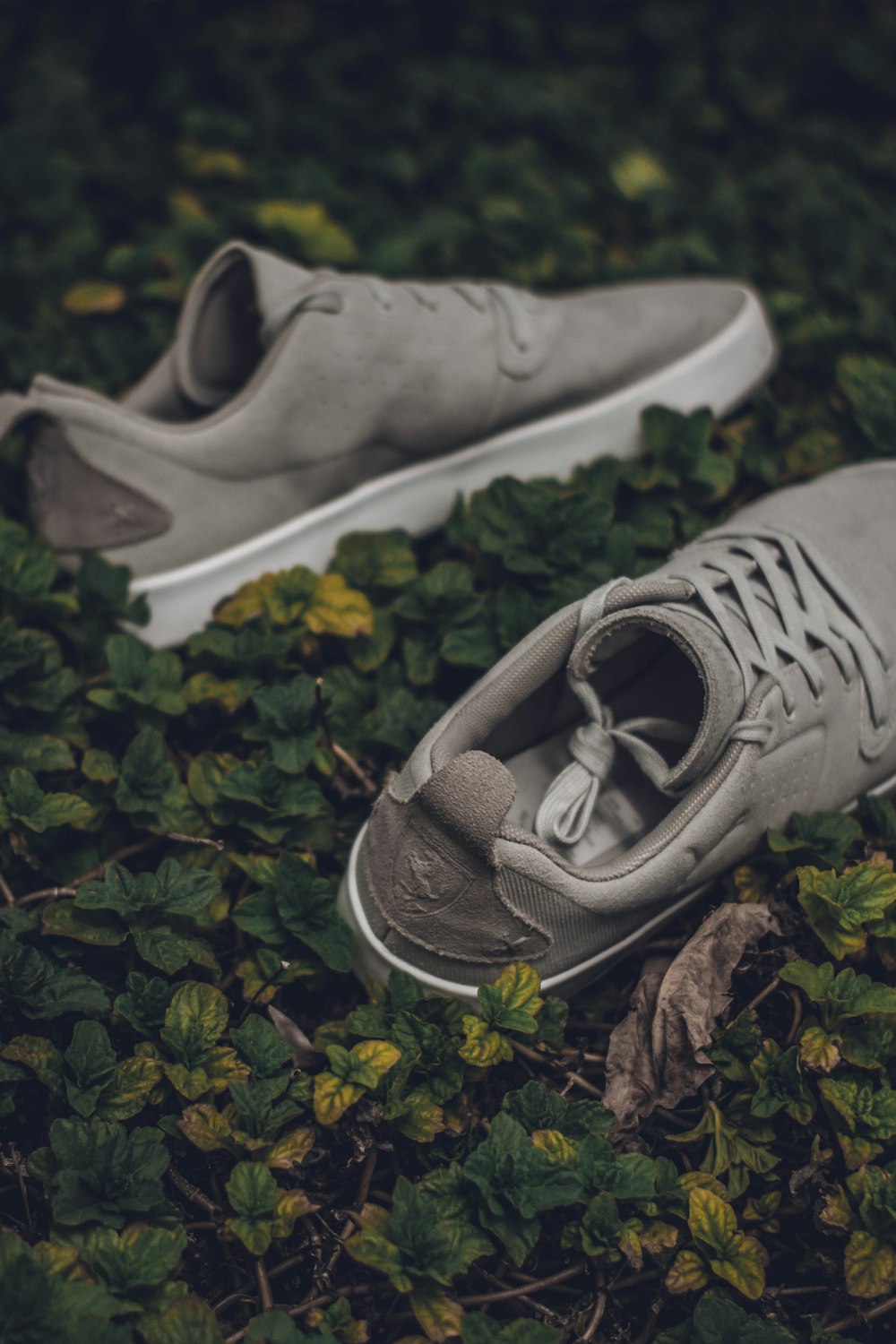 pair f gray low-top sneakers
