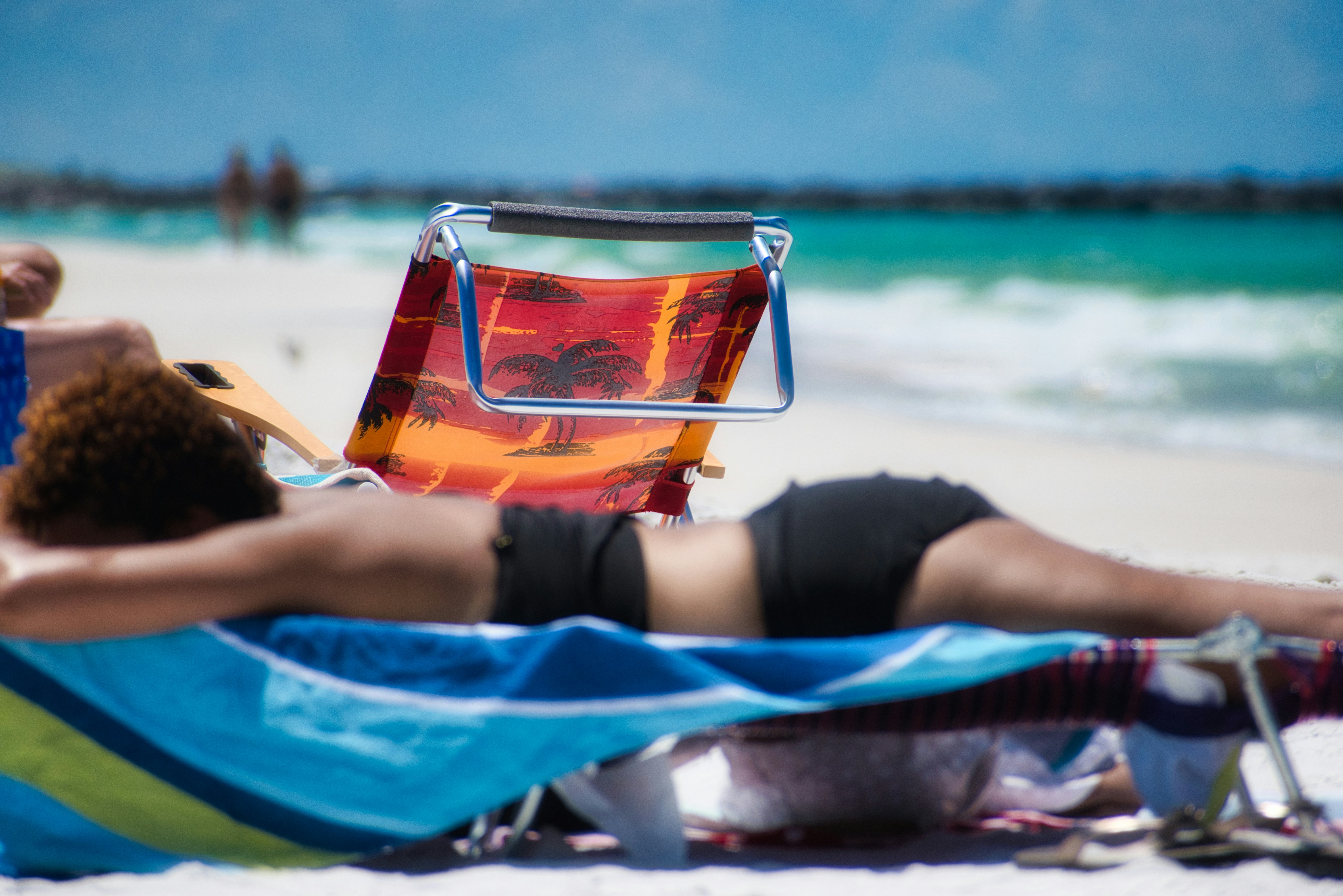 woman lies in lounger