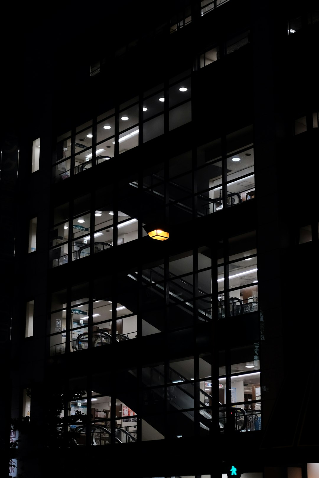 selective focus photography of building during nighttime