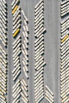 A lineup of the latest model buses ready for transport.