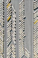 A fleet of buses ready for passenger transport.