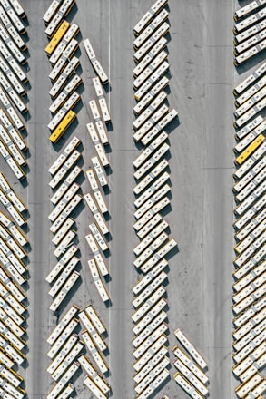 A fleet of buses ready for passenger transport.