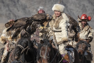 Traditional Kazakh eagle hunting demonstration in the vast steppe.