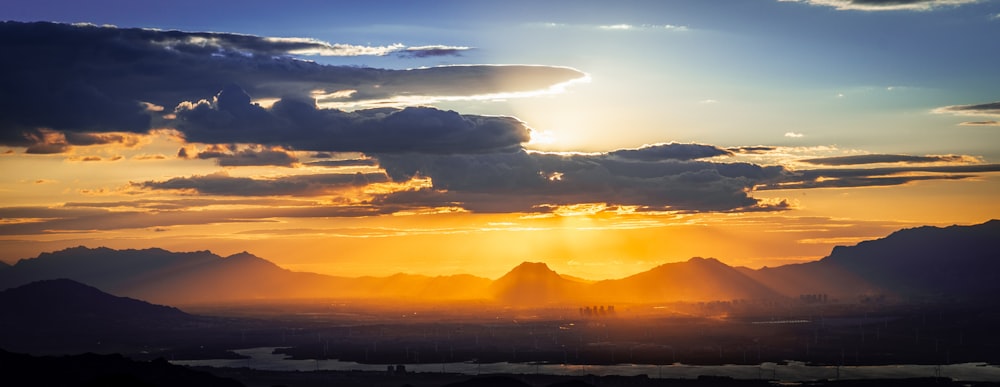 silhouette mountain during sunset