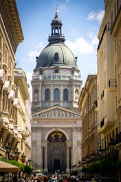 people in the street surrounded with buildings