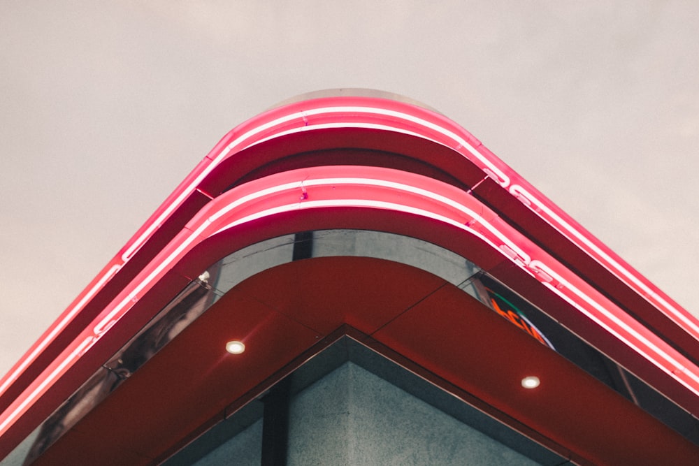 low-angle photography of red building