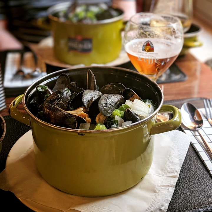 Pot of steamed mussels.